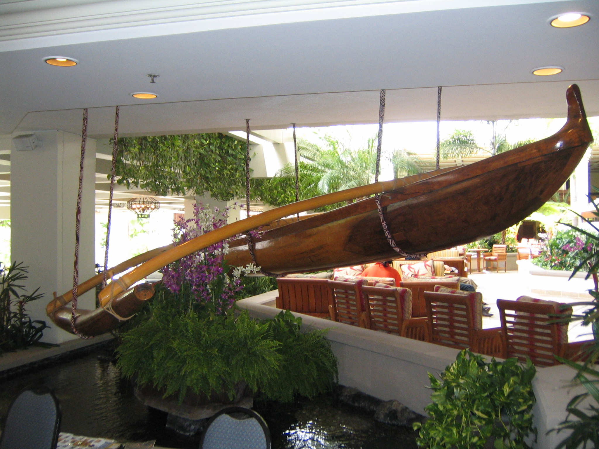 Canoe suspended in hotel lobby